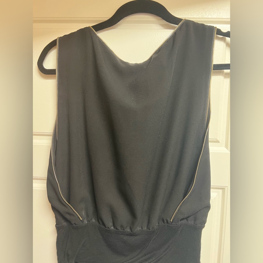 Bebe black Small/petite gold zipper trimmed sleeveless blouse.